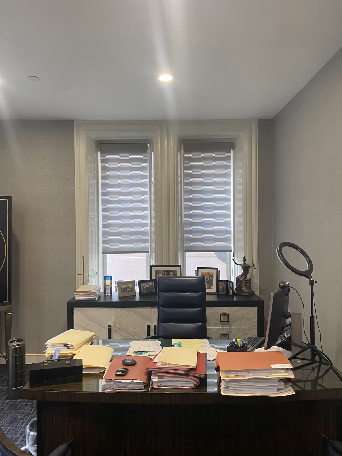Zebra shades on two office windows